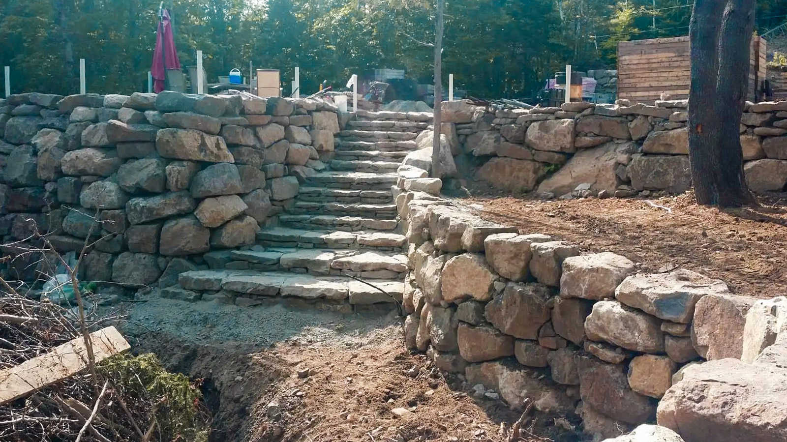 Stone Wall Installation by Venado Landscaping